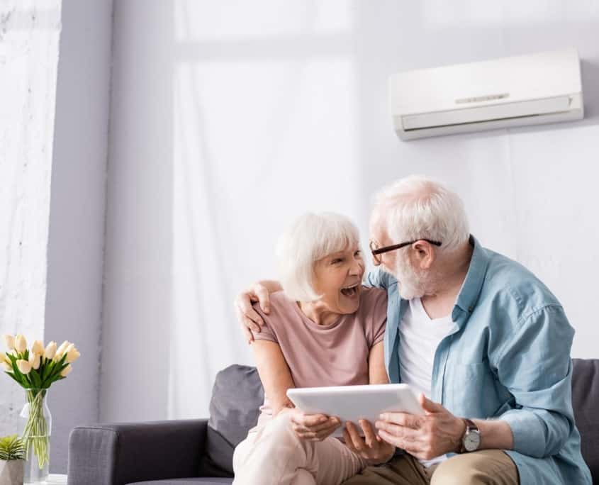 Older couple happy with HVAC system