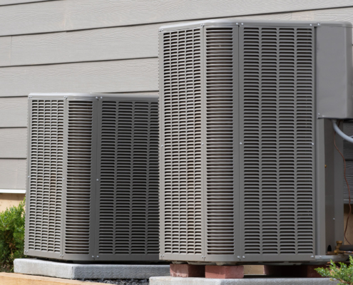 Side view of two AC units outside